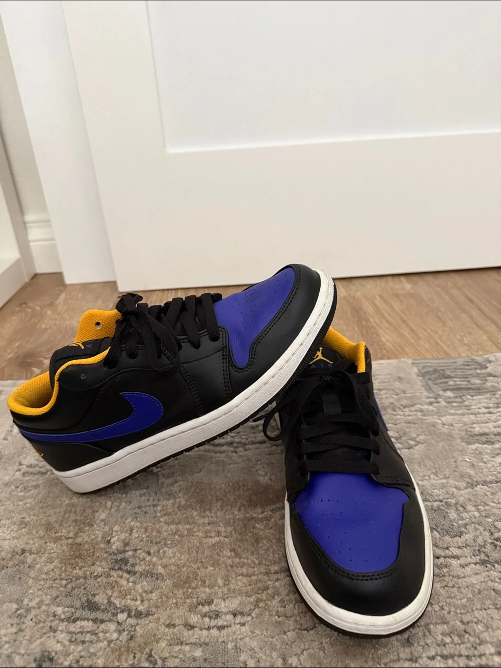 Jordan 1 Low-Top Sneakers in Black, Royal Blue & Yellow